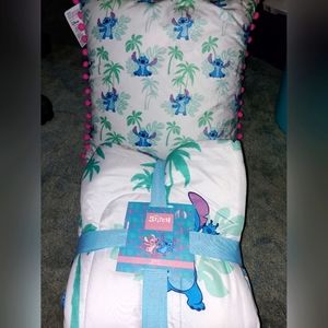 Disney's stitch quilt and throw pillow